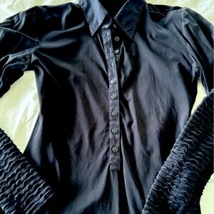 Anne Fontaine black top with slight puff sleeve. Size 40